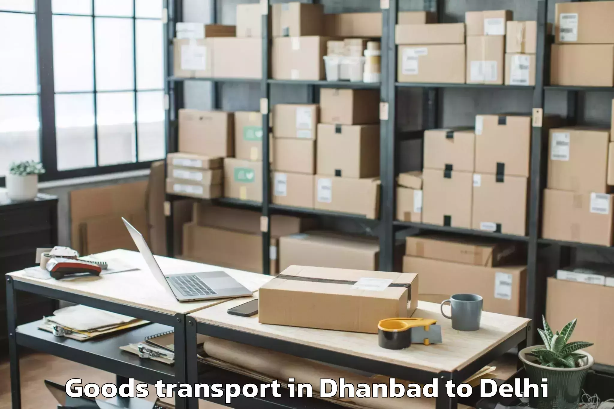 Hassle-Free Dhanbad to Jawaharlal Nehru University Ne Goods Transport